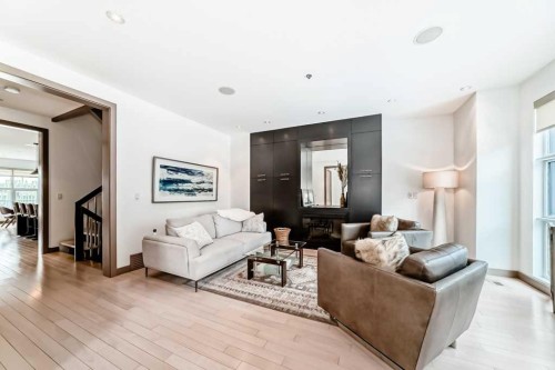 701 Aspen Meadows Hill Sw, Calgary, AB - Indoor Photo Showing Living Room With Fireplace