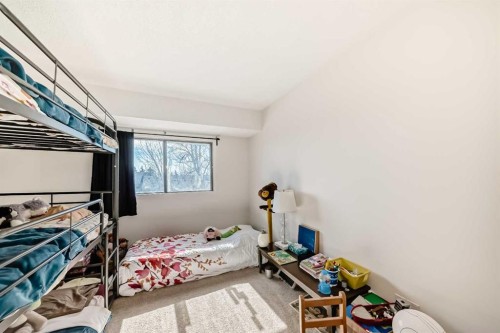 97-6915 Ranchview Drive Nw, Calgary, AB - Indoor Photo Showing Bedroom