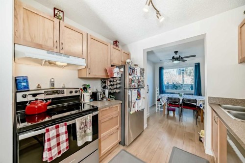 97-6915 Ranchview Drive Nw, Calgary, AB - Indoor Photo Showing Kitchen With Double Sink