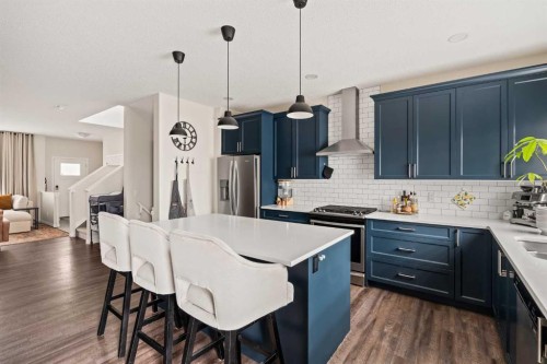 123 Magnolia Square Se, Calgary, AB - Indoor Photo Showing Kitchen With Stainless Steel Kitchen With Upgraded Kitchen