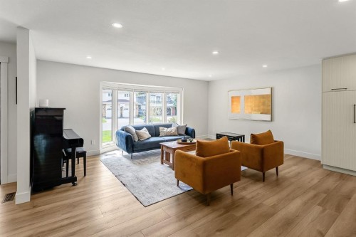 75 Woodacres Crescent Sw, Calgary, AB - Indoor Photo Showing Living Room