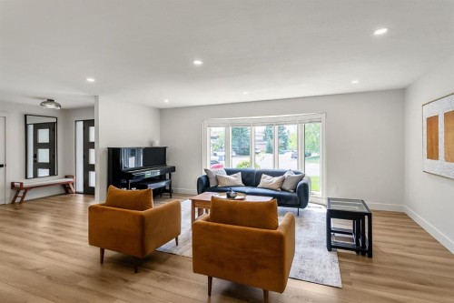 75 Woodacres Crescent Sw, Calgary, AB - Indoor Photo Showing Living Room