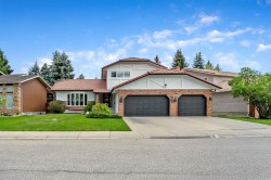 75 Woodacres Crescent SW Calgary, AB T2W 4V5