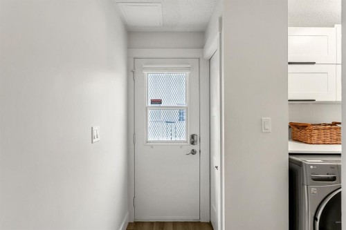 75 Woodacres Crescent Sw, Calgary, AB - Indoor Photo Showing Laundry Room