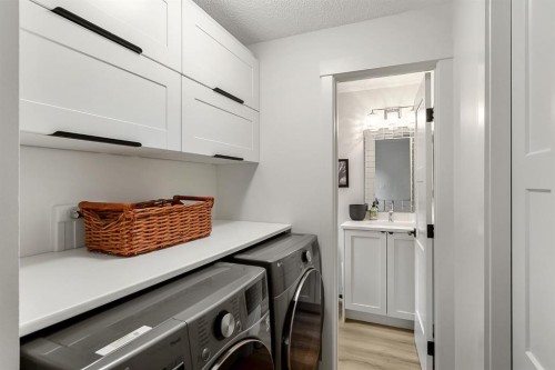 75 Woodacres Crescent Sw, Calgary, AB - Indoor Photo Showing Laundry Room