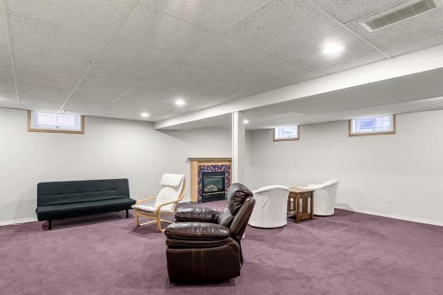 75 Woodacres Crescent Sw, Calgary, AB - Indoor Photo Showing Basement