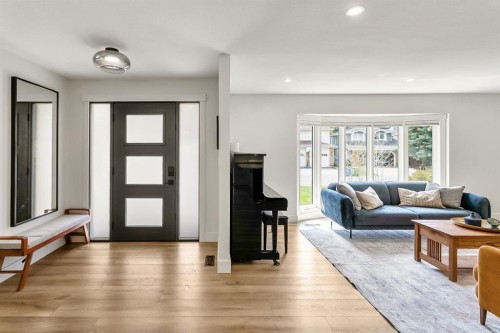 75 Woodacres Crescent Sw, Calgary, AB - Indoor Photo Showing Living Room