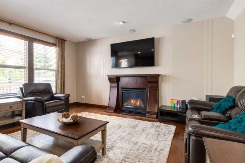 12 Mahogany Heath Se, Calgary, AB - Indoor Photo Showing Living Room With Fireplace