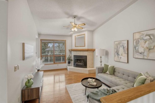 240 Varsity Estates Terrace Nw, Calgary, AB - Indoor Photo Showing Living Room With Fireplace