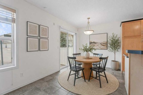 2317 Eversyde Avenue Sw, Calgary, AB - Indoor Photo Showing Dining Room