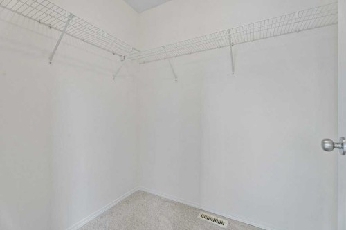 2317 Eversyde Avenue Sw, Calgary, AB - Indoor With Storage