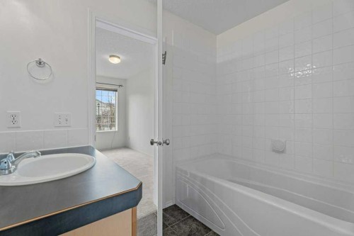 2317 Eversyde Avenue Sw, Calgary, AB - Indoor Photo Showing Bathroom