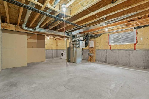 2317 Eversyde Avenue Sw, Calgary, AB - Indoor Photo Showing Basement