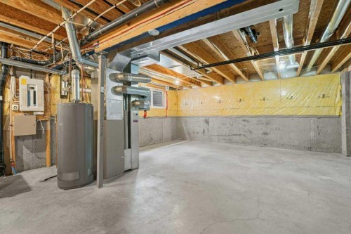 2317 Eversyde Avenue Sw, Calgary, AB - Indoor Photo Showing Basement