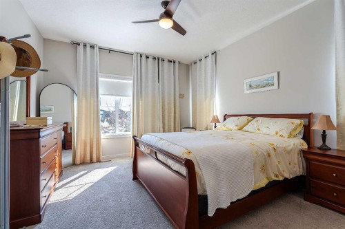 511 Kingsmere Way Se, Airdrie, AB - Indoor Photo Showing Bedroom