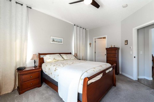 511 Kingsmere Way Se, Airdrie, AB - Indoor Photo Showing Bedroom