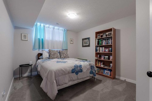511 Kingsmere Way Se, Airdrie, AB - Indoor Photo Showing Bedroom