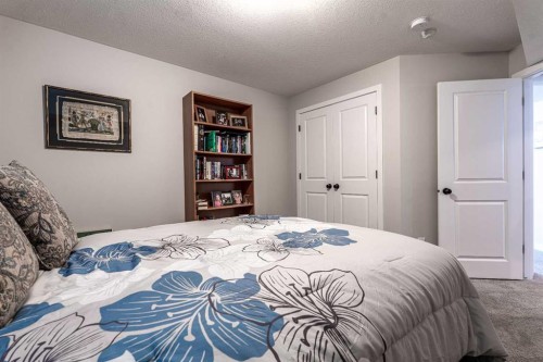 511 Kingsmere Way Se, Airdrie, AB - Indoor Photo Showing Bedroom