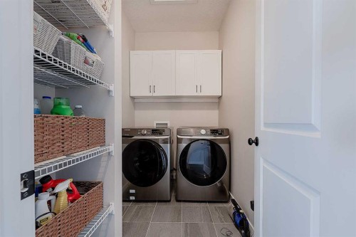 511 Kingsmere Way Se, Airdrie, AB - Indoor Photo Showing Laundry Room