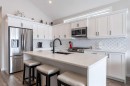511 Kingsmere Way Se, Airdrie, AB  - Indoor Photo Showing Kitchen With Upgraded Kitchen 
