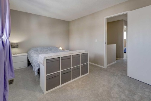 107 Macewan Park Way Nw, Calgary, AB - Indoor Photo Showing Bedroom
