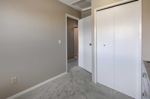 107 Macewan Park Way Nw, Calgary, AB - Indoor Photo Showing Other Room