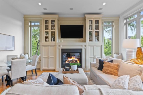108 Posthill Drive Sw, Calgary, AB - Indoor Photo Showing Living Room With Fireplace