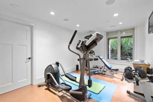 108 Posthill Drive Sw, Calgary, AB - Indoor Photo Showing Gym Room