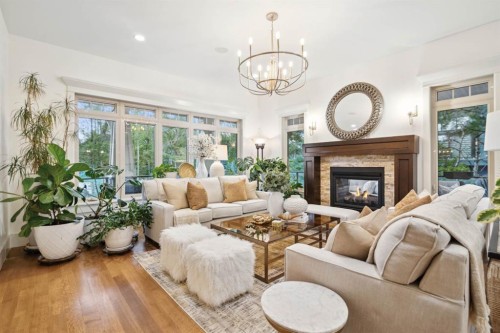 108 Posthill Drive Sw, Calgary, AB - Indoor Photo Showing Living Room With Fireplace