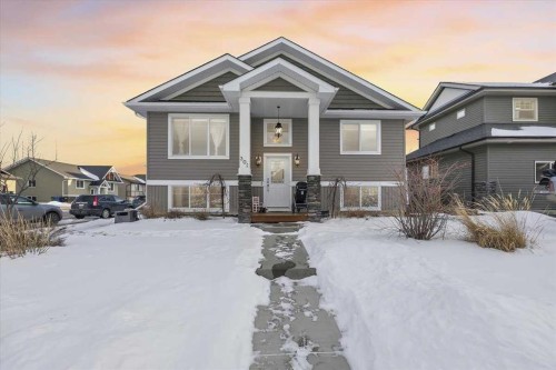 301 Mcleod Crescent, Diamond Valley, AB - Outdoor With Facade