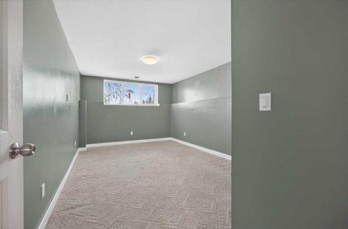 301 Mcleod Crescent, Diamond Valley, AB - Indoor Photo Showing Other Room