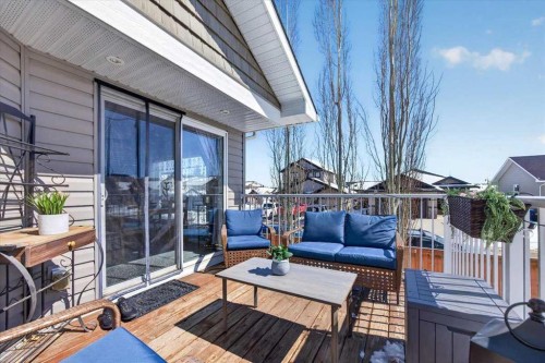 301 Mcleod Crescent, Diamond Valley, AB - Outdoor With Deck Patio Veranda With Exterior
