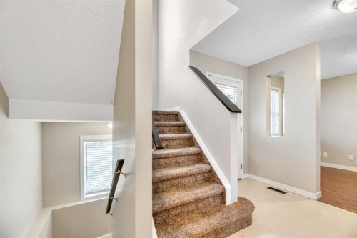 84 Evermeadow Manor Sw, Calgary, AB - Indoor Photo Showing Other Room