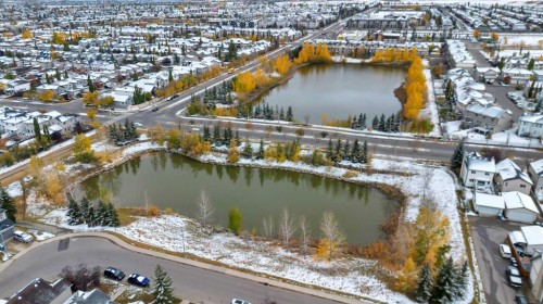 84 Evermeadow Manor Sw, Calgary, AB - Outdoor With Body Of Water With View