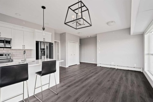 409-4350 Seton Drive Se, Calgary, AB - Indoor Photo Showing Kitchen With Upgraded Kitchen