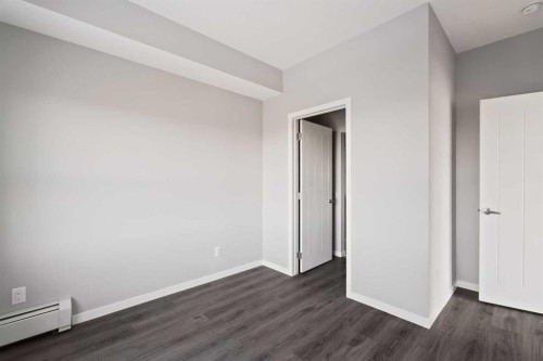 409-4350 Seton Drive Se, Calgary, AB - Indoor Photo Showing Other Room