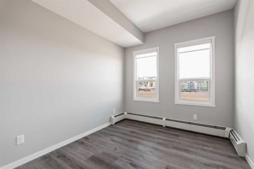 409-4350 Seton Drive Se, Calgary, AB - Indoor Photo Showing Other Room