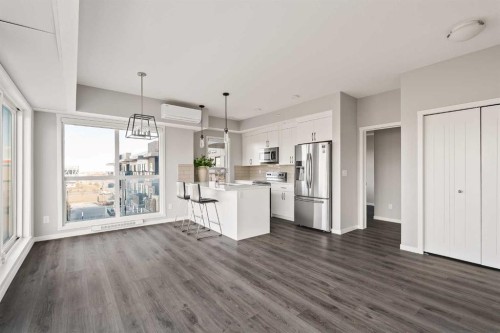409-4350 Seton Drive Se, Calgary, AB - Indoor Photo Showing Kitchen With Upgraded Kitchen