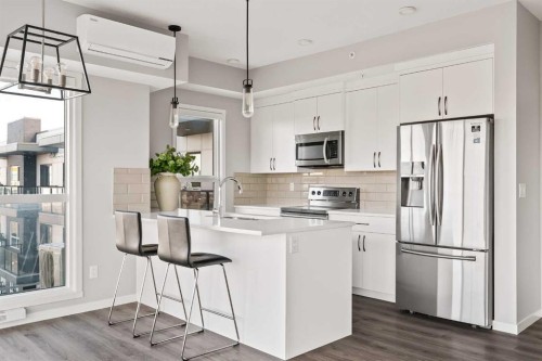 409-4350 Seton Drive Se, Calgary, AB - Indoor Photo Showing Kitchen With Upgraded Kitchen