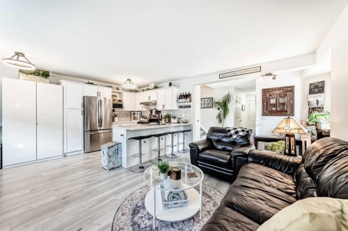 15 Spring Meadows Bay, Okotoks, AB - Indoor Photo Showing Living Room