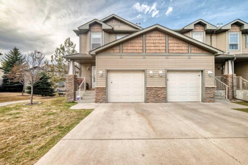 15 Spring Meadows Bay, Okotoks, AB - Outdoor With Facade