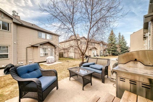 15 Spring Meadows Bay, Okotoks, AB - Outdoor With Deck Patio Veranda With Exterior