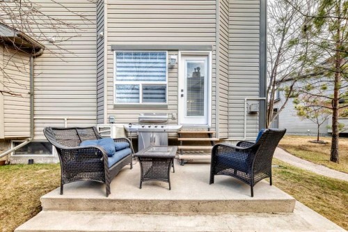 15 Spring Meadows Bay, Okotoks, AB - Outdoor With Deck Patio Veranda