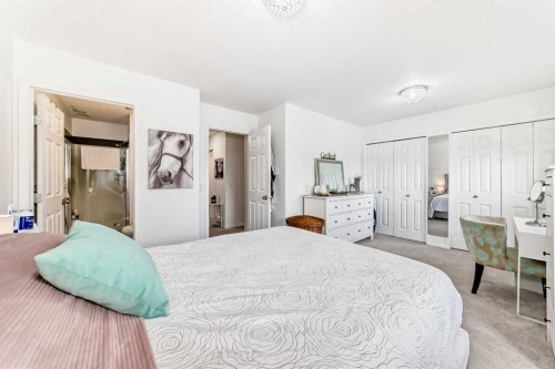 15 Spring Meadows Bay, Okotoks, AB - Indoor Photo Showing Bedroom