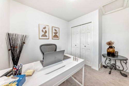15 Spring Meadows Bay, Okotoks, AB - Indoor Photo Showing Other Room