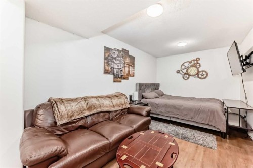 15 Spring Meadows Bay, Okotoks, AB - Indoor Photo Showing Bedroom