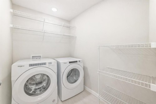 149 Lavender Manor Se, Calgary, AB - Indoor Photo Showing Laundry Room