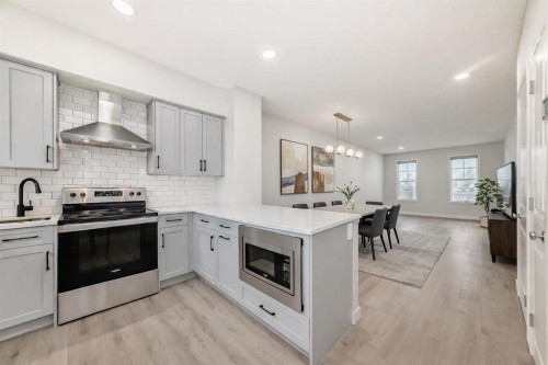 149 Lavender Manor Se, Calgary, AB - Indoor Photo Showing Kitchen With Upgraded Kitchen