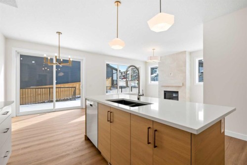305 Precedence View, Cochrane, AB - Indoor Photo Showing Kitchen With Double Sink