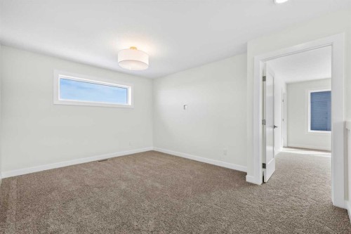 305 Precedence View, Cochrane, AB - Indoor Photo Showing Other Room